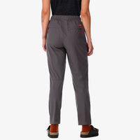 Topo Designs Women's Lightweight Tech Pants in "charcoal" gray on model back
