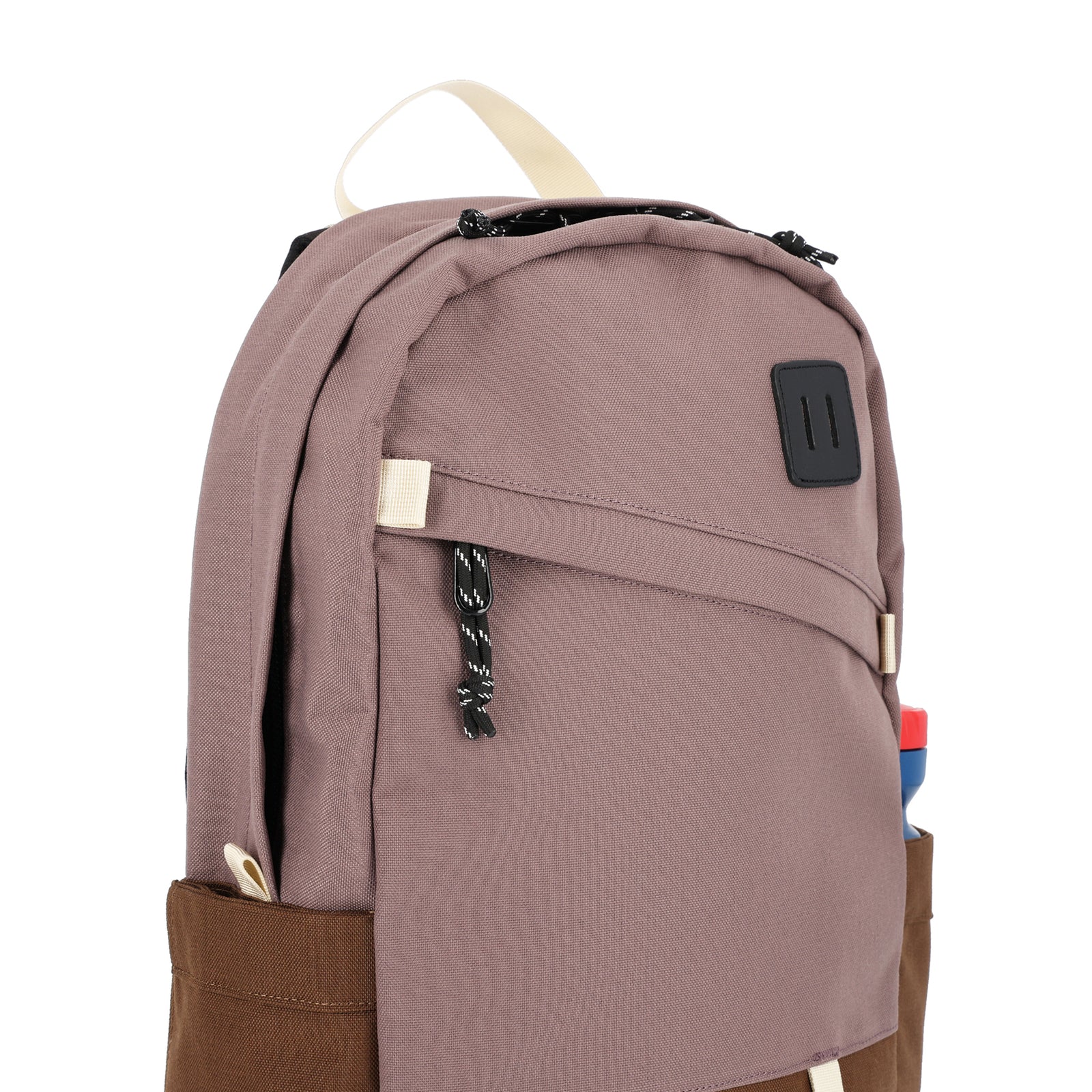General detail of Topo Designs Daypack Classic 100% recycled nylon laptop backpack for work or school in "Peppercorn / Cocoa" purple brown