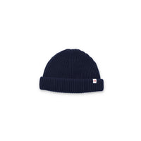 Topo Designs Global Beanie merino wool blend watchman cap in "navy" blue.