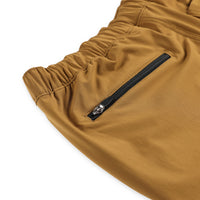 Detail shot of back zipper pocket on Topo Designs Men's Boulder lightweight climbing & hiking pants in "dark khaki" brown