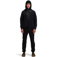 Front model shot of Topo Designs Men's Dirt Hoodie 100% organic cotton French terry sweatshirt in "black".