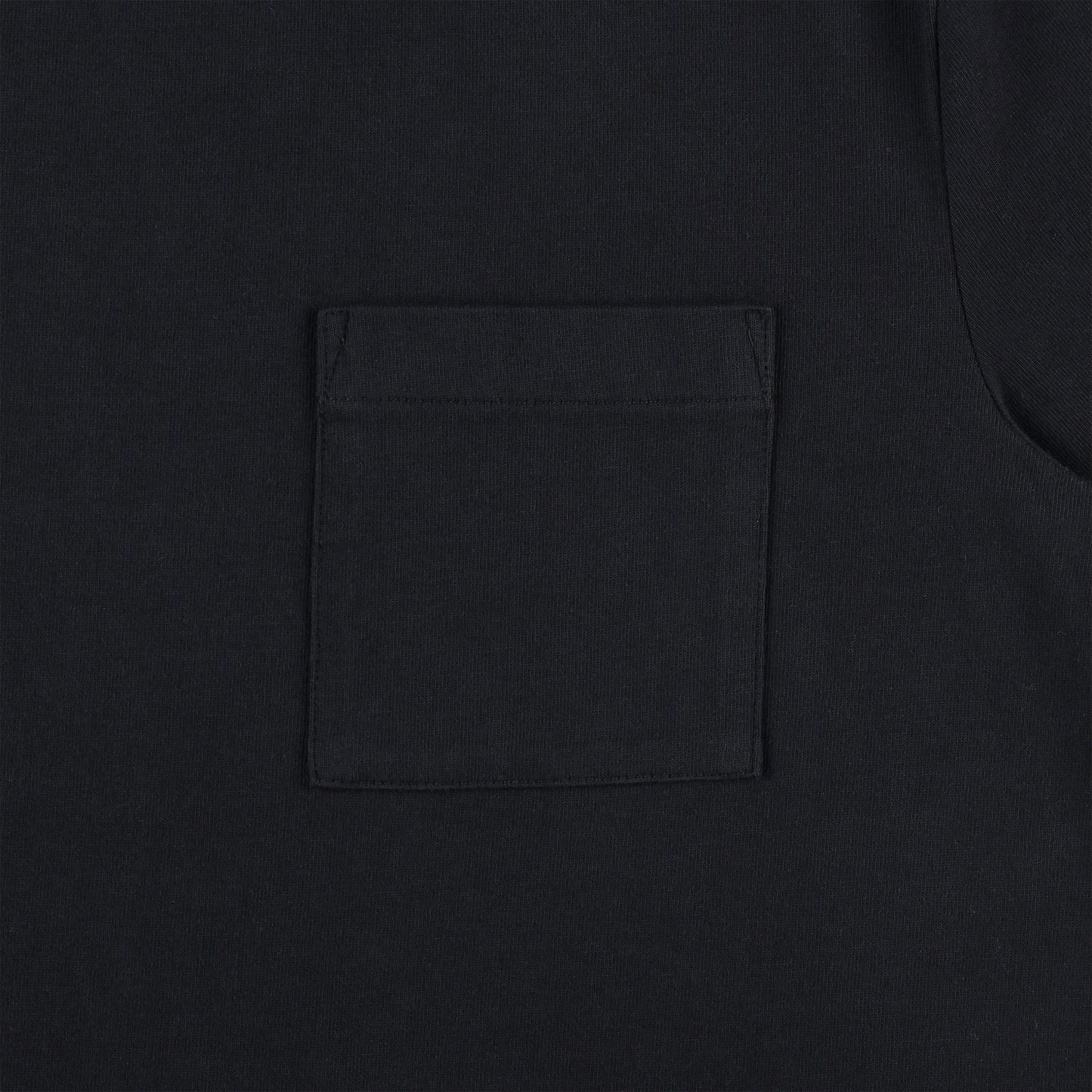 General detail shot of chest pocket on Topo Designs Men's Dirt Pocket Tee 100% organic cotton short sleeve t-shirt in "black"