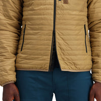 Front model shot of double zipper on Topo Designs Men's Global Puffer packable recycled insulated Hoodie jacket in "dark khaki" brown