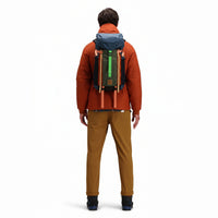 Back model shot of Topo Designs Men's Boulder lightweight climbing & hiking pants in "dark khaki" brown. 