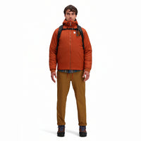 Front model shot of Topo Designs Men's Boulder lightweight climbing & hiking pants in "dark khaki" brown. 