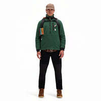 Front model shot of Topo Designs Men's Mountain Fleece Pullover in "Forest" green.