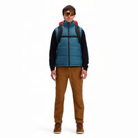 Front model shot of Topo Designs Men's Mountain Puffer recycled insulated Vest in "Pond Blue"