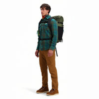 Front model shot of Topo Designs Men's Mountain Shirt Heavyweight "Green / Earth Plaid" brown blue button-up.