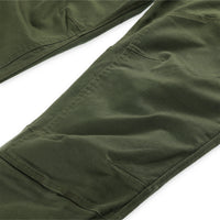 General detail shot of double-layered articulated knee panels on Topo Designs Men's Mountain Pants in organic cotton "olive" green