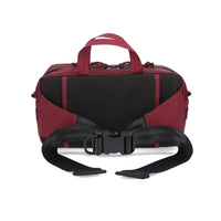 Back of Topo Designs Quick Pack hip fanny pack in "Burgundy" red recycled nylon.