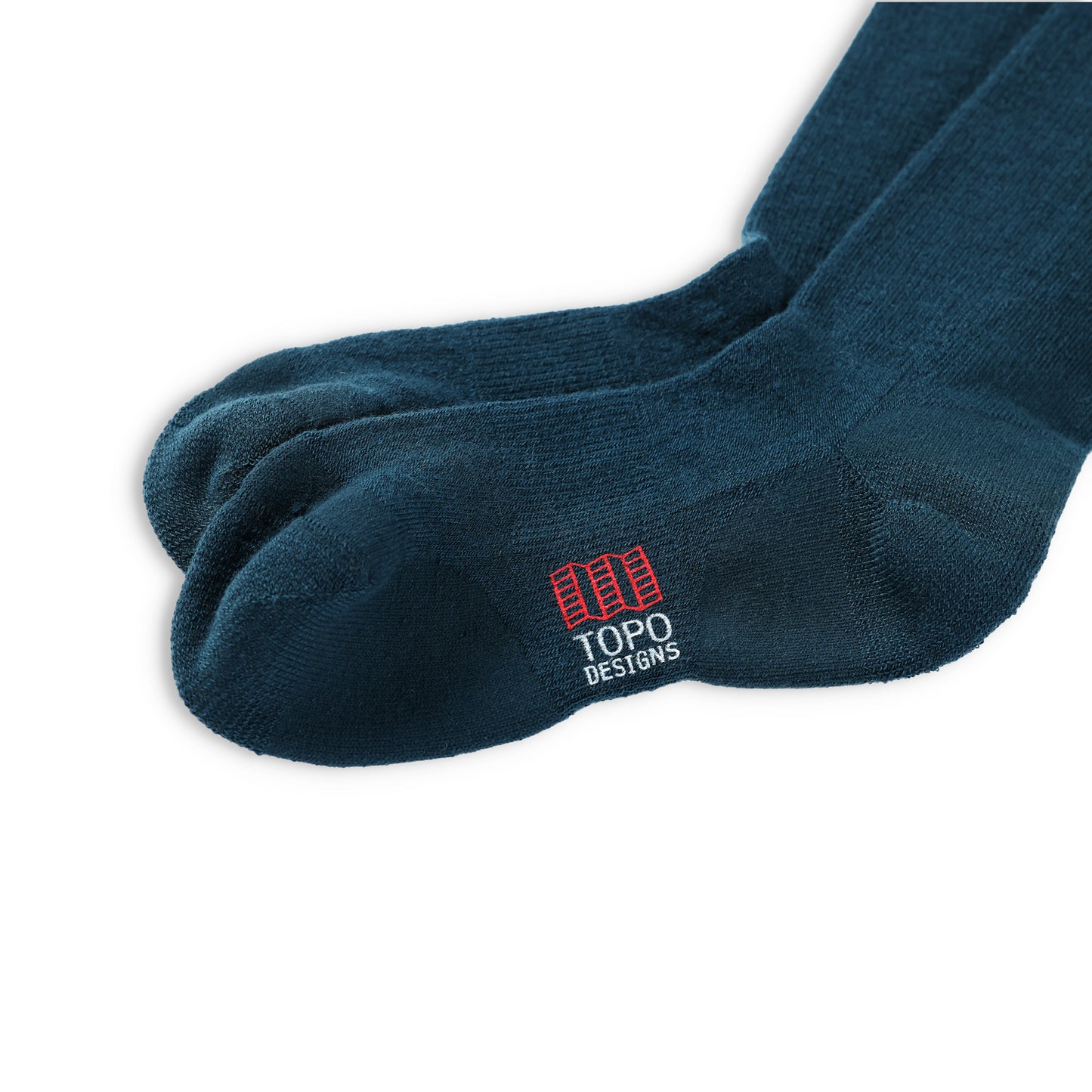 General detail shot of logo on Topo Designs Town lightweight wool blend everyday socks in "Pond Blue"