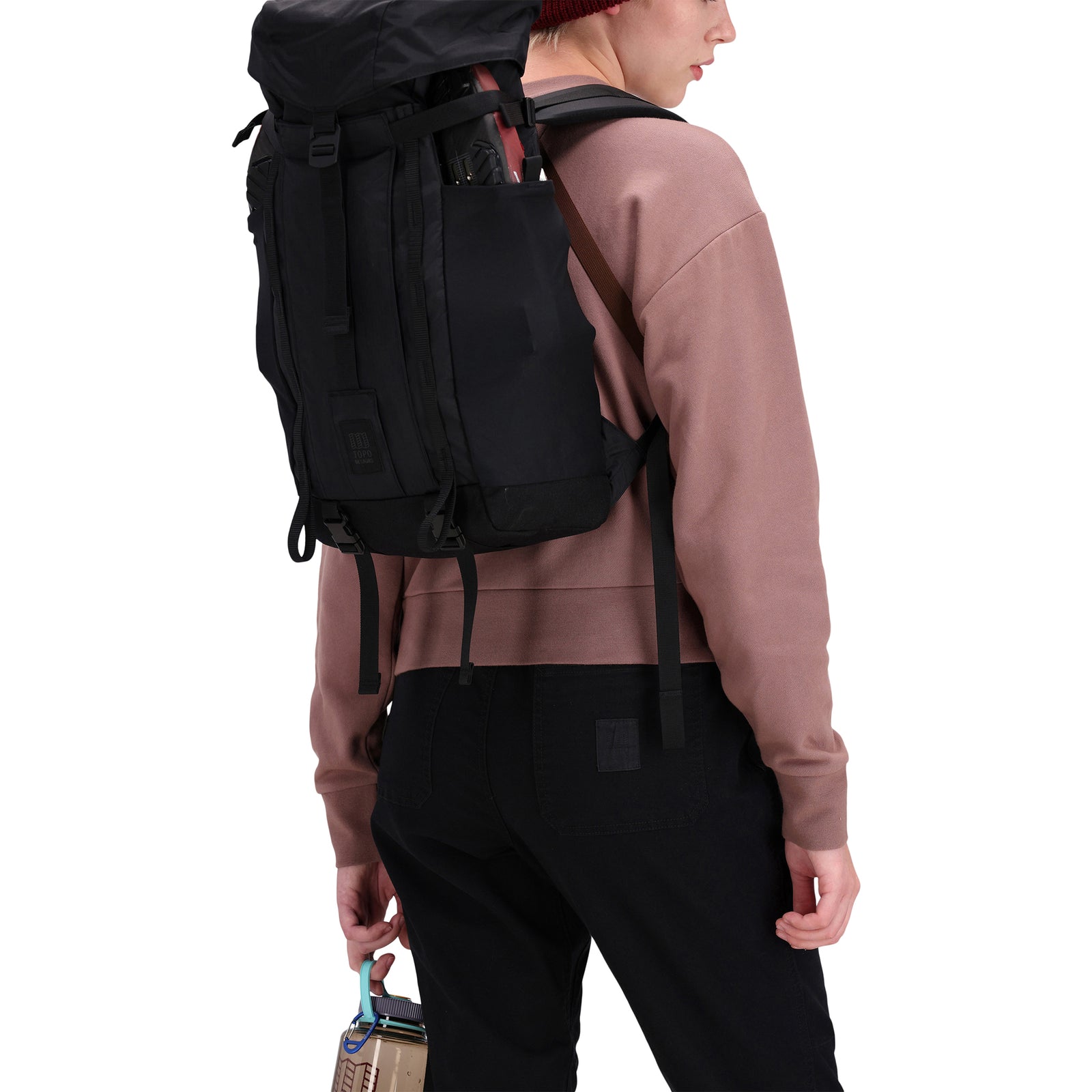 Back model shot of Topo Designs Women's Dirt Pants in 100% organic cotton with drawstring waist in "Black"