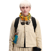 Front model shot of Topo Designs Women's Dirt Jacket 100% organic cotton shirt jacket in "sand" brown white