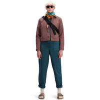 Front model shot of Topo Designs Women's Dirt Coverall 100% organic cotton short sleeve jumpsuit in "pond blue"