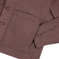General detail shot of Topo Designs Women's Dirt Jacket in Peppercorn showing front pockets and sleeve cuff