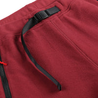 General detail shot of waist belt on Topo Designs Women's Fleece Pants in "Burgundy / Black"