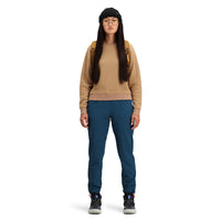 Front model shot of Topo Designs women's boulder lightweight hiking and climbing pants in "pond blue". 