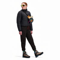 Front model shot of Topo Designs Women's Puffer recycled insulated Jacket in "Black"