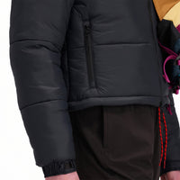 Front model shot of Topo Designs women's boulder lightweight hiking and climbing pants in "black" showing hand pockets.