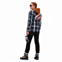 Back model shot of Topo Designs Women's Mountain Shirt Jacket in "navy / white plaid"