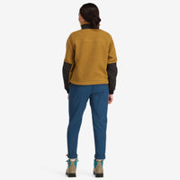 Back model shot of Topo Designs women's boulder lightweight hiking and climbing pants in "pond blue"