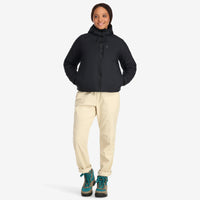 Front model shot of Topo Designs Women's Puffer Primaloft insulated Hoodie jacket in "black"