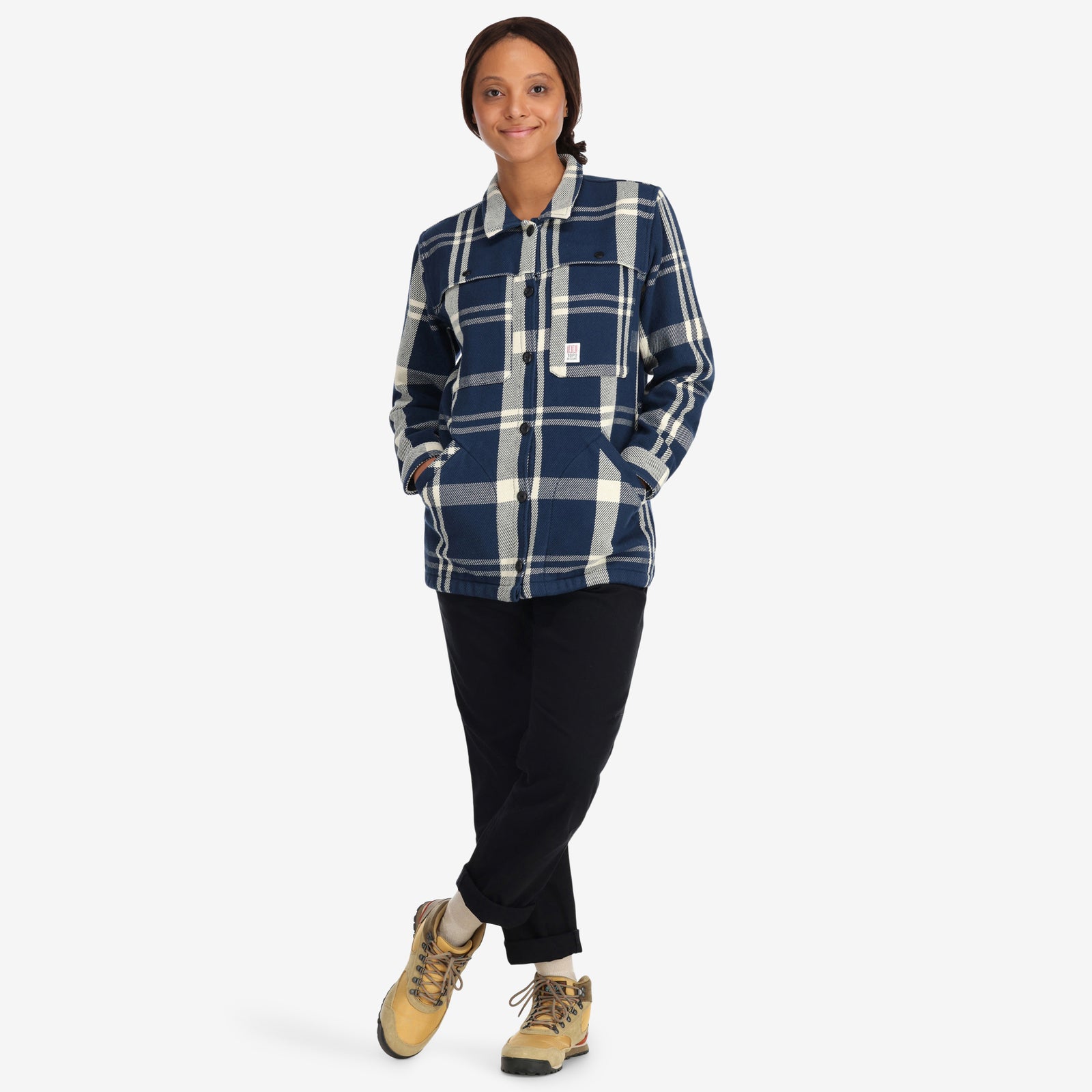 Front model shot of Topo Designs Women's Mountain Shirt Jacket in "navy / white plaid" 