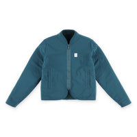 Topo Designs Women's sherpa fleece reversible jacket in "Pond Blue" showing DWR side