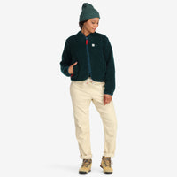 General front model shot of Topo Designs Women's sherpa fleece reversible jacket in "Pond Blue"