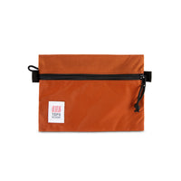 Topo Designs Accessory Bags in "Medium" "Clay - Recycled" orange.