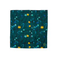 Topo Designs bandana in "Gear / Forest / Blue - Final Sale" print with carabiners and cams.