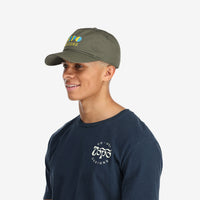 General shot of Topo Designs 5 Panel Snapback Hat, embroidered logo baseball cap in olive green on model.