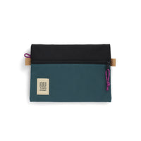 Topo Designs Accessory Bags in "Medium" "Botanic Green / Black - Recycled" nylon.