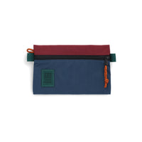 Topo Designs Accessory Bag in "Small" "Pond Blue / Zinfandel - Recycled" red nylon.