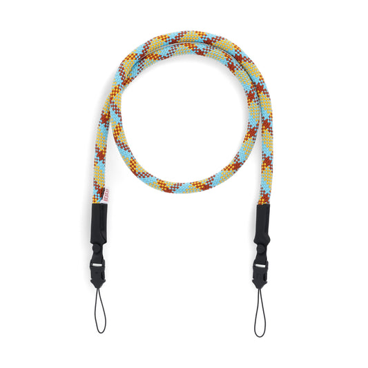 Topo Designs Camera Strap in "Mustard / Clay" yellow orange and blue.
