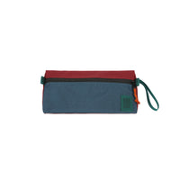 Topo Designs Dopp Kit toiletry travel bag in recycled "Pond Blue / Zinfandel - Recycled" red nylon.