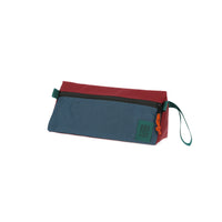 Topo Designs Dopp Kit toiletry travel bag in recycled "Pond Blue / Zinfandel - Recycled" red nylon.