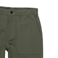 General shot of front pockets on Topo Designs Men's Global Pants lightweight cotton nylon travel pants in olive green.