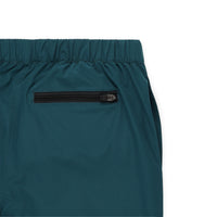 General shot of back zipper pocket on Topo Designs Men's River Shorts Lightweight quick dry swim trunks in pond blue.