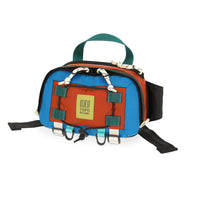 Topo Designs Mountain Hip Pack lumbar bum bag in lightweight recycled orange "Clay / Blue" nylon.