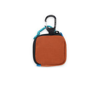 Back of Topo Designs Square Bag carabiner clip keychain wallet in "Clay" orange nylon.