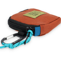 Carabiner clip and zipper pull on Topo Designs Square Bag keychain wallet in recycled "clay" orange nylon.