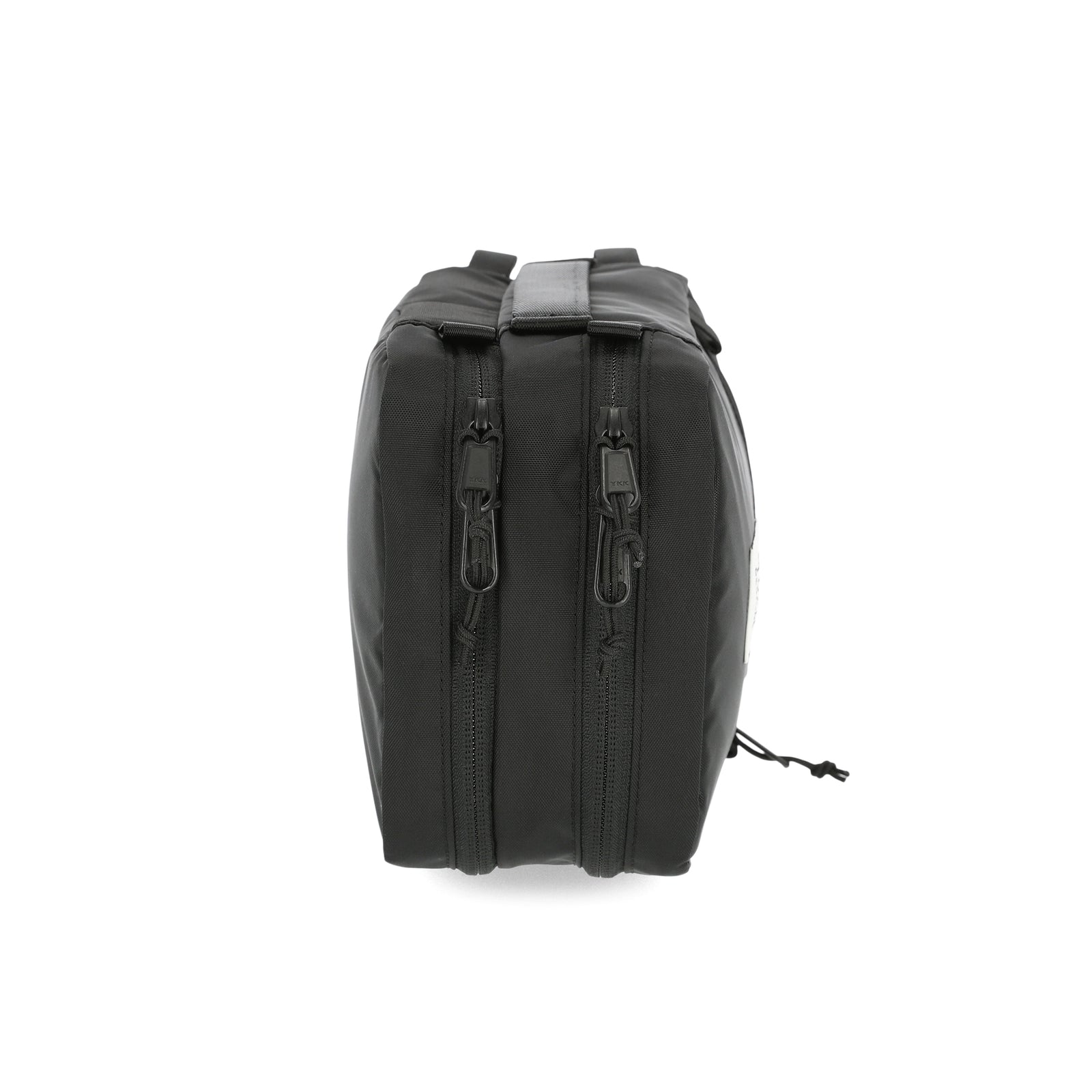 General side shot of Topo Designs Tech electronics organization travel Case in black recycled nylon.