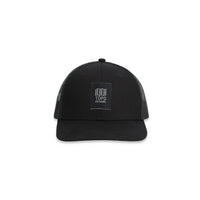 Topo Designs Trucker Hat with mesh back and original logo patch in "Black".