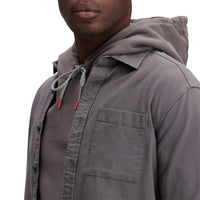 Detail shot of Topo Designs Men's Dirt Shirt long sleeve organic cotton button-up in "charcoal".