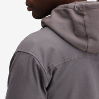 Detail shot of Topo Designs Men's Dirt Shirt long sleeve organic cotton button-up in "charcoal".