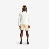 Model shot of Topo Designs Men's Dirt Crew sweatshirt in 100% organic cotton in "natural".