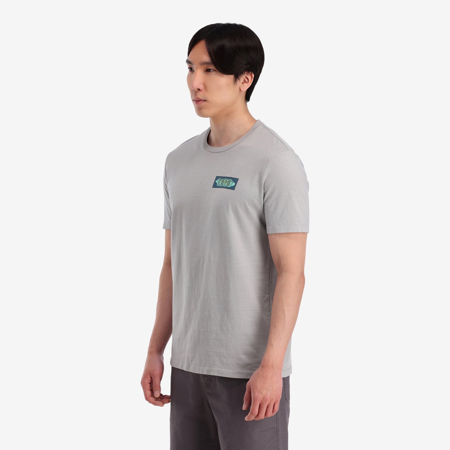On model left side view Topo Designs Men's Geographic Tee 100% organic cotton short sleeve graphic logo t-shirt in "gray".
