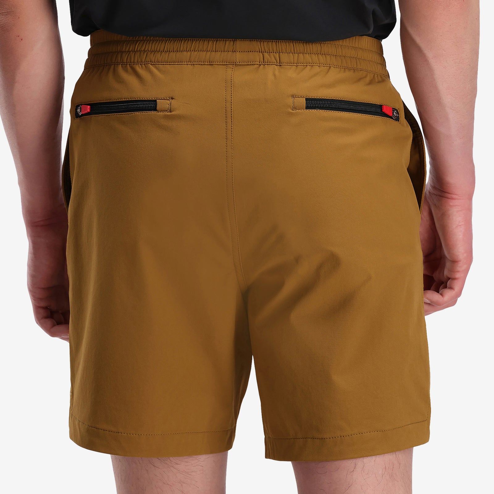 General on model photo of back zipper pockets on Topo Designs Men's Global lightweight quick dry travel Shorts.