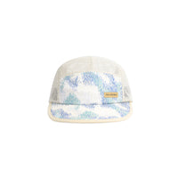Front shot of Topo Designs Global mesh back Hat in "Sand / Pebble" white. Unstructured 5-panel flexible brim packable hat.